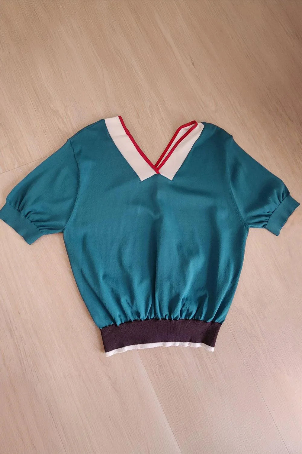 Retro Teal Chevron Knit Top with Contrasting Accents